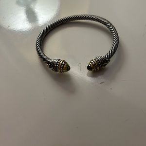 Silver bracelet with green stones